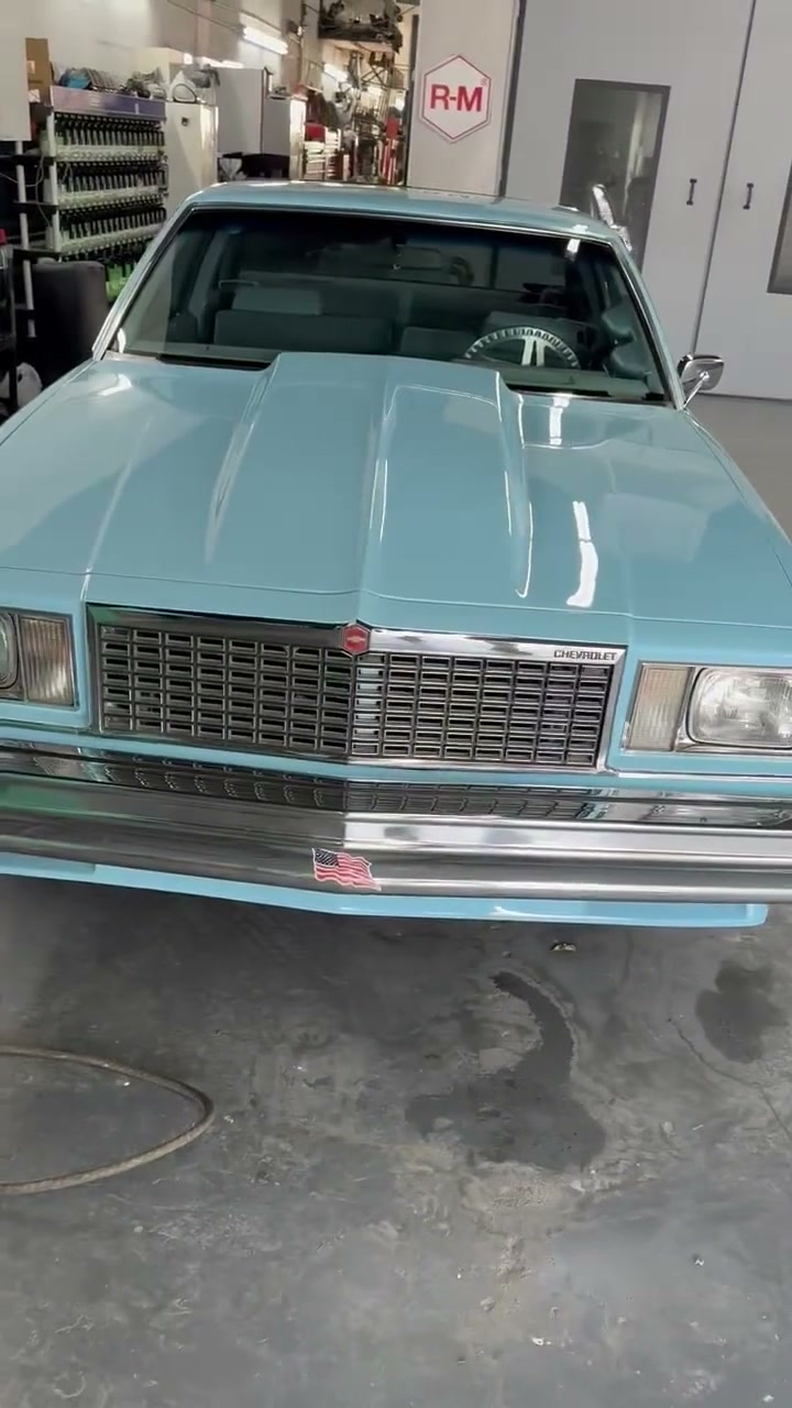 Walkaround of the classic Chevy Malibu in fresh light blue paint after a full repaint